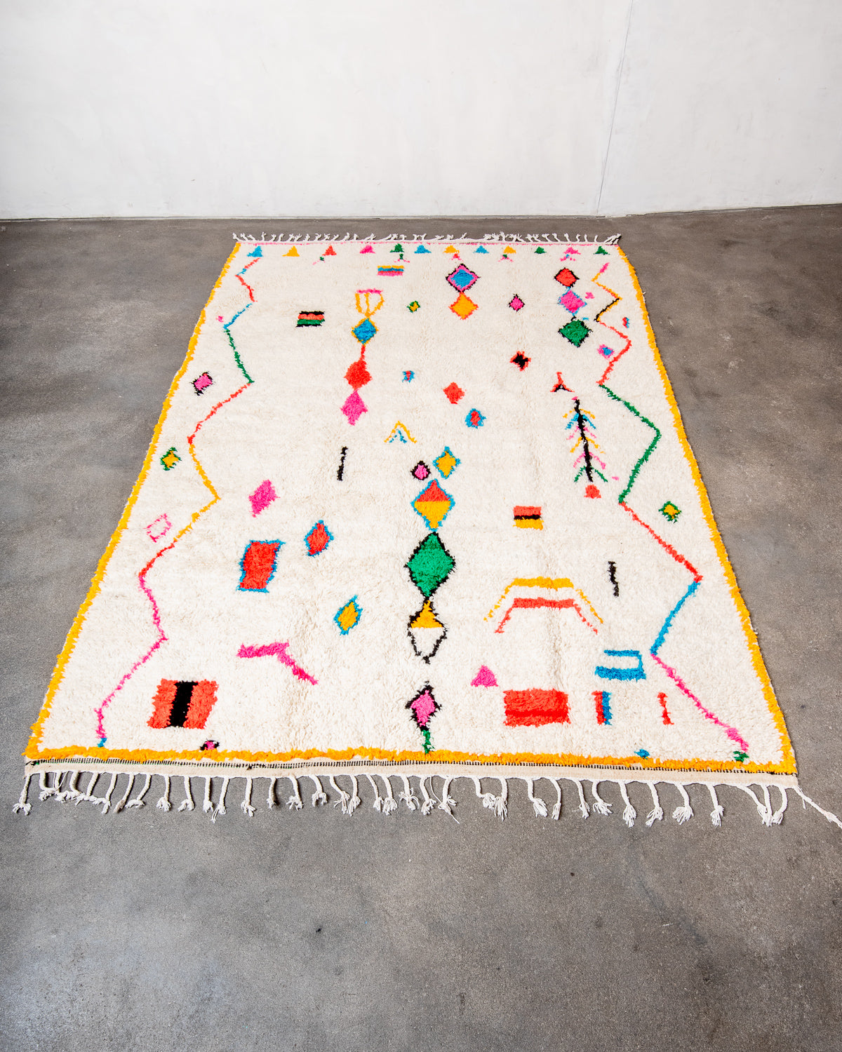 Modern designer handcrafted Berber rug from morocco Azilal with beautiful colors and patterns.